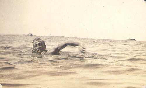 Scanned photo of Hugh Adams swimming.