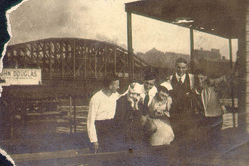 Scanned photo of group on houseboat.