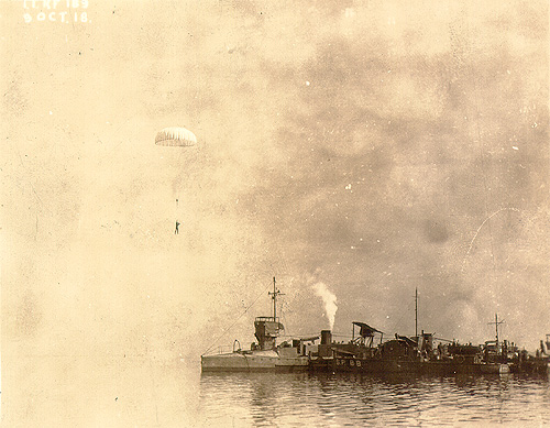 Scanned photo of parachute drop.