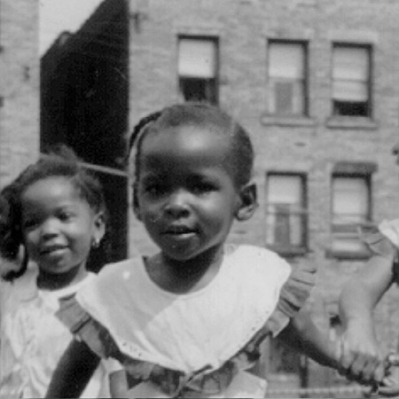 Scanned image of young girl 
in parklet (detail).