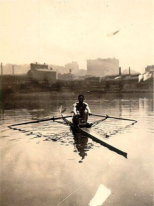 Photo of Hugh Adams rowing on the Allegheny River.