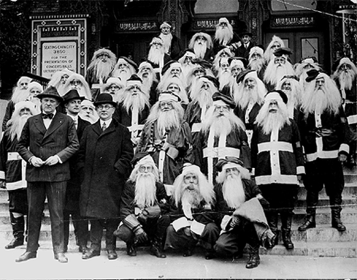 Photo of Santas in front of the Syria Mosque.