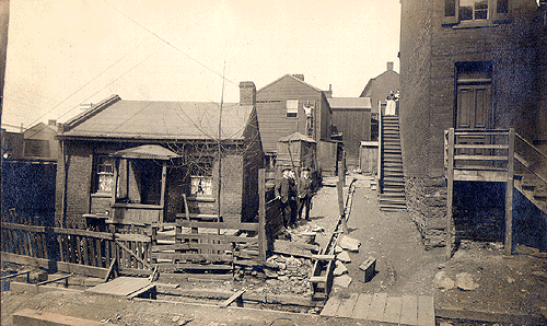 Photograph 
of a court on Maurice Street.