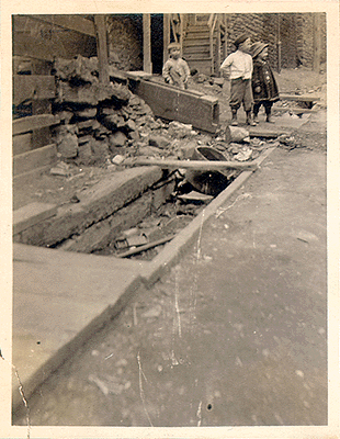 Photograph 
of clogged drain on Maurice Street.