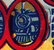 Thumbnail: Scanned stamp of locomotives framed by the 
number 88,000 (detail).