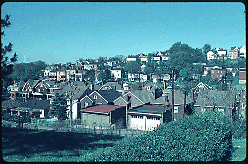 Scanned slide of hillside houses.