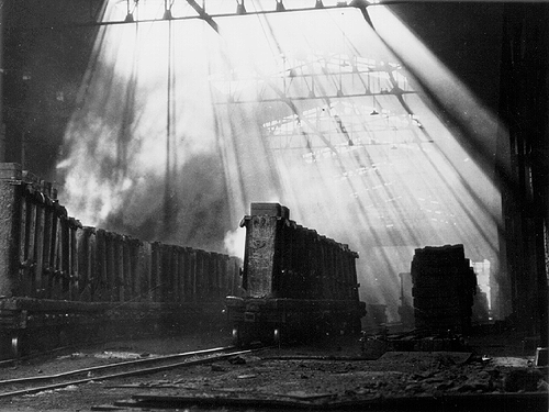 Scanned photo of interior of steel mill.