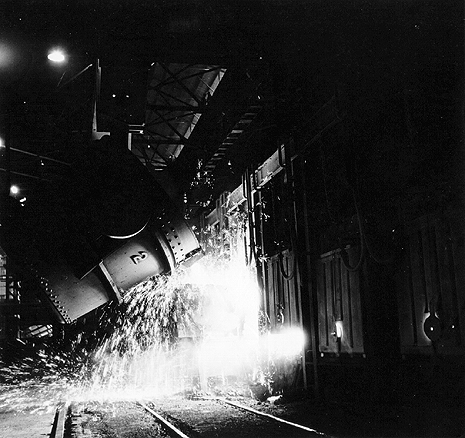 Scanned photo of steel being poured.