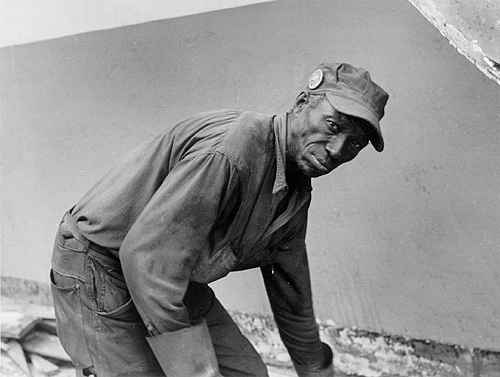 Scanned photo of demolition worker.